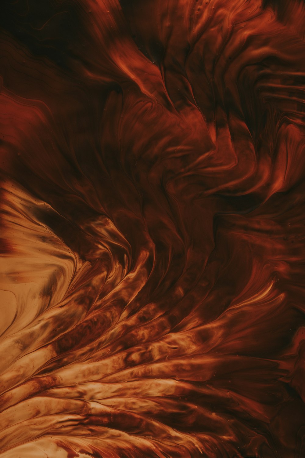 a close up of a red and orange swirl
