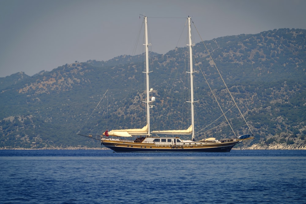 a large boat floating on top of a large body of water