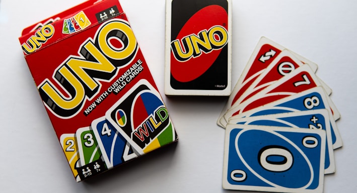 uno uno cards and a card game on a table