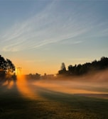 Modern sunrise alarm clock displaying gentle orange light simulating a sunrise