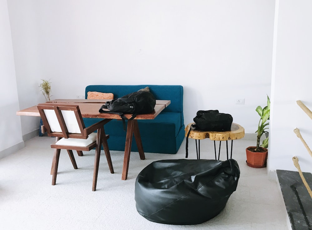 a living room filled with furniture and a blue couch