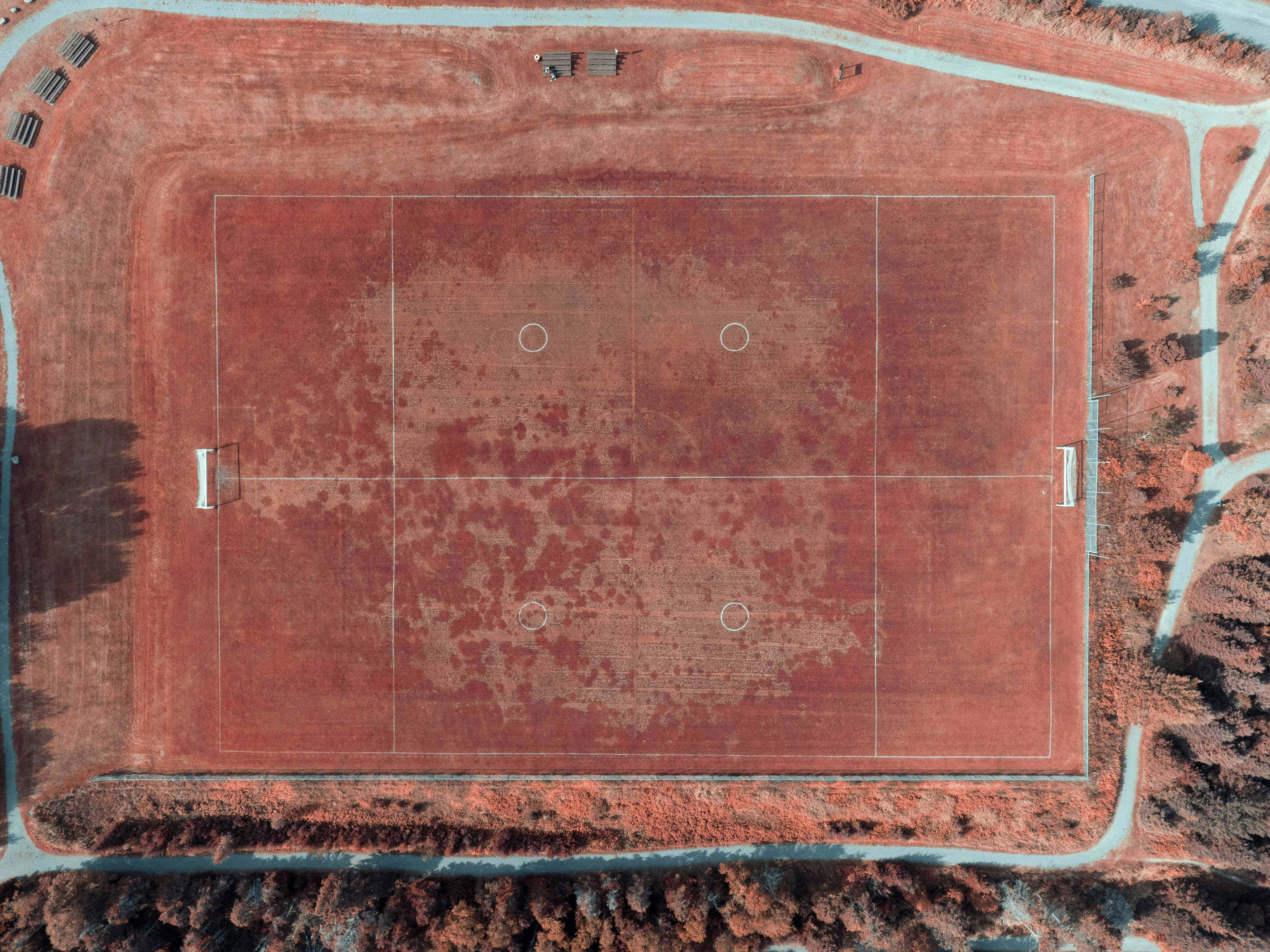 an aerial view of a soccer field in the middle of nowhere