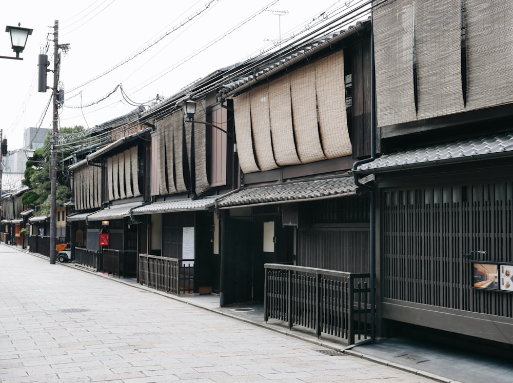 a row of buildings sitting on the side of a street