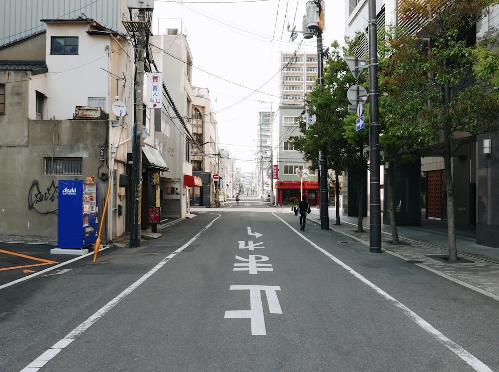 a city street with a white line painted on the road