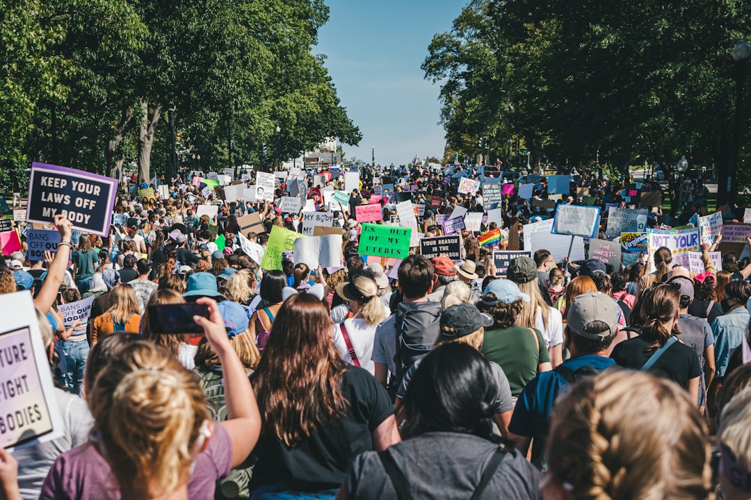 a large group of people holding up signs, Rally For Abortion Justice