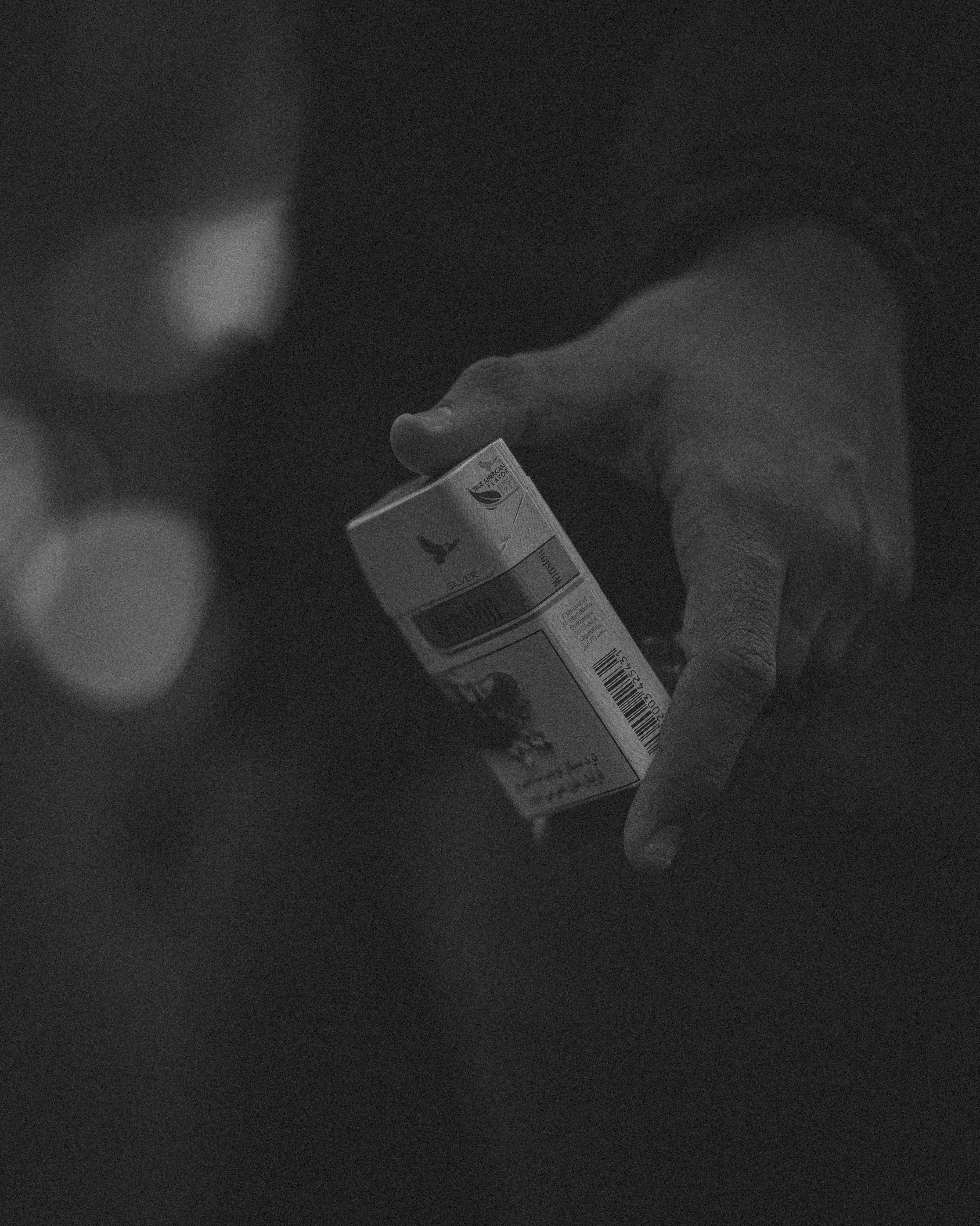 a person holding a package in their hand