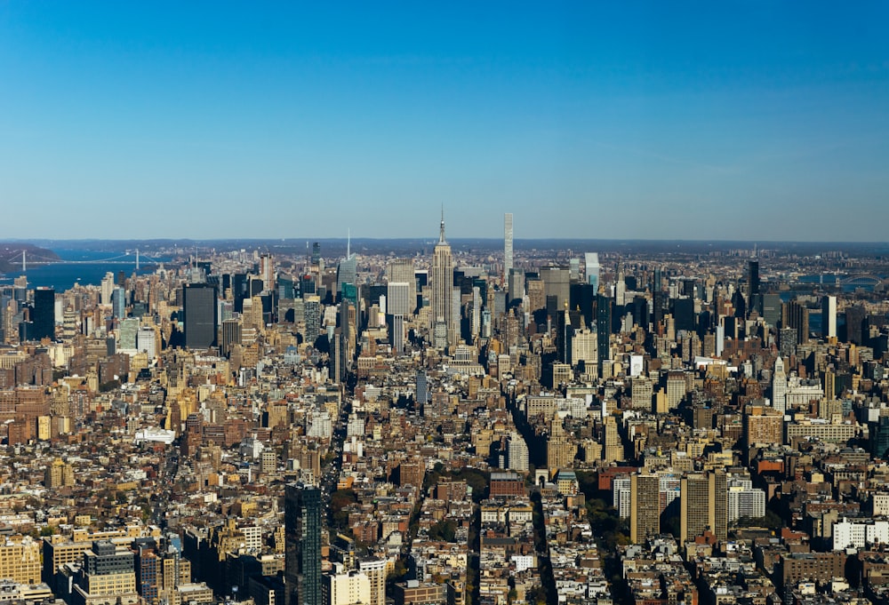 an aerial view of a city with tall buildings