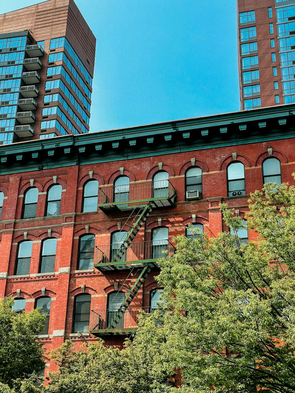 a fire escape on the side of a brick building