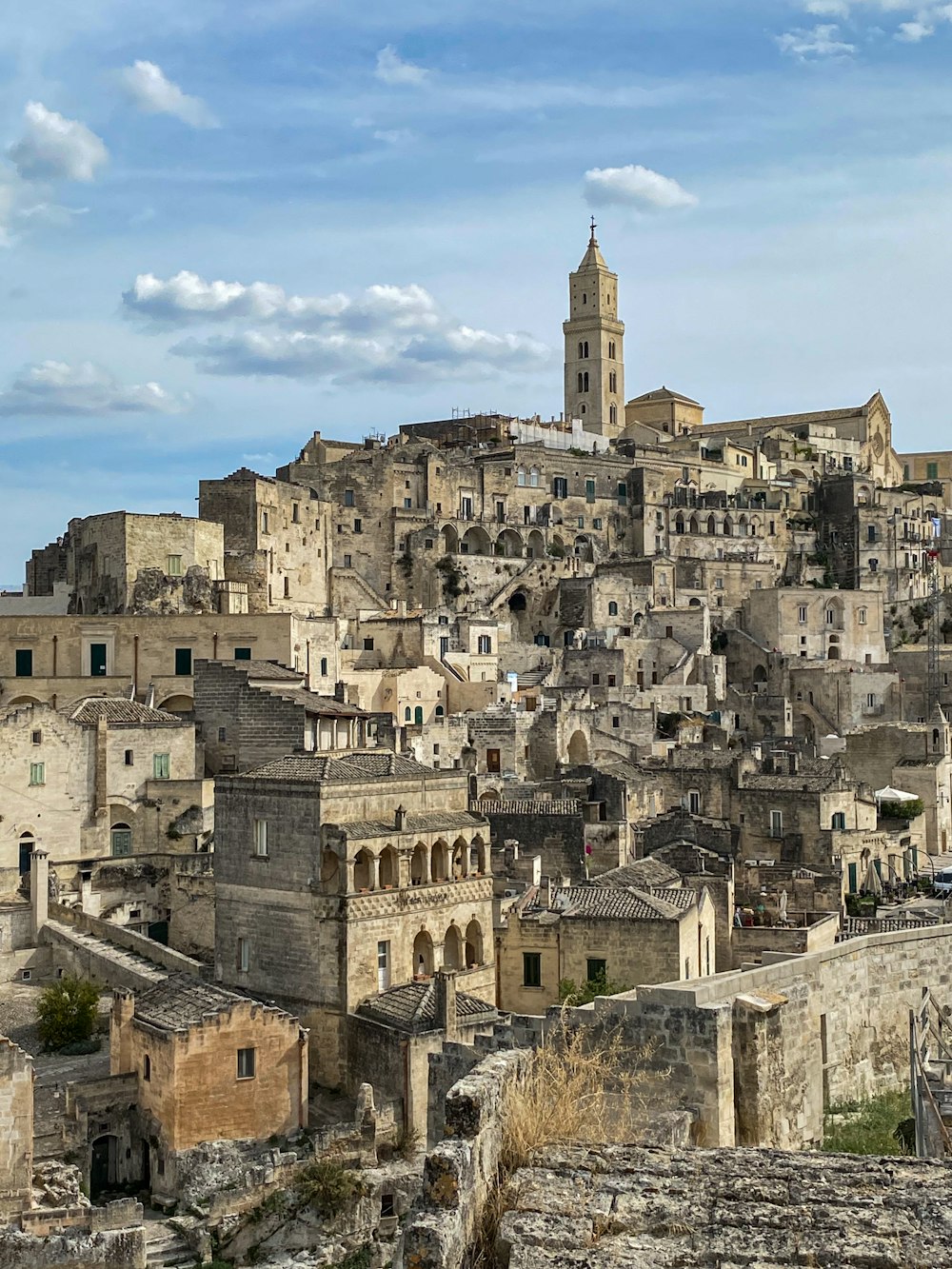 a view of a very old city with a clock tower