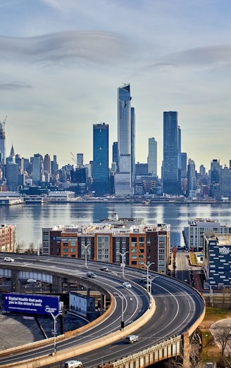 best quality movers view of a city skyline with a highway going through it