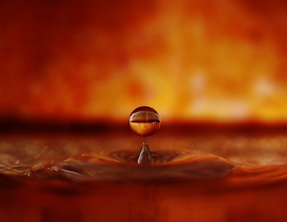 a drop of water that is on top of a table