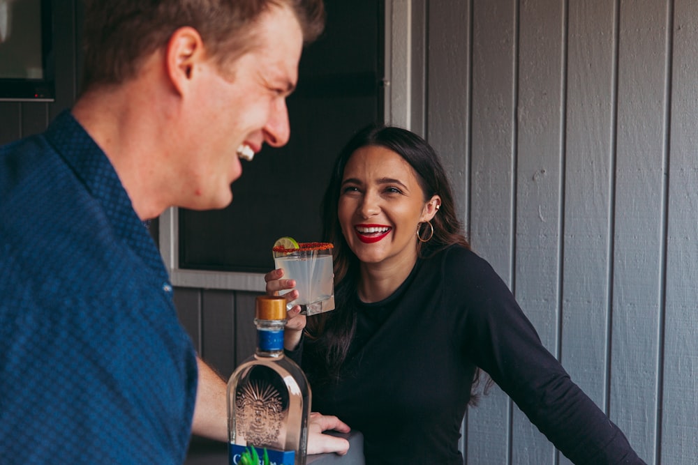 a man and a woman standing next to each other