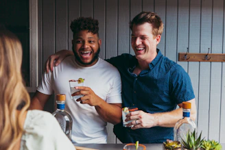 a couple of men standing next to each other