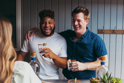 a couple of men standing next to each other