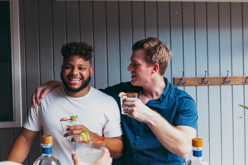 a couple of men standing next to each other