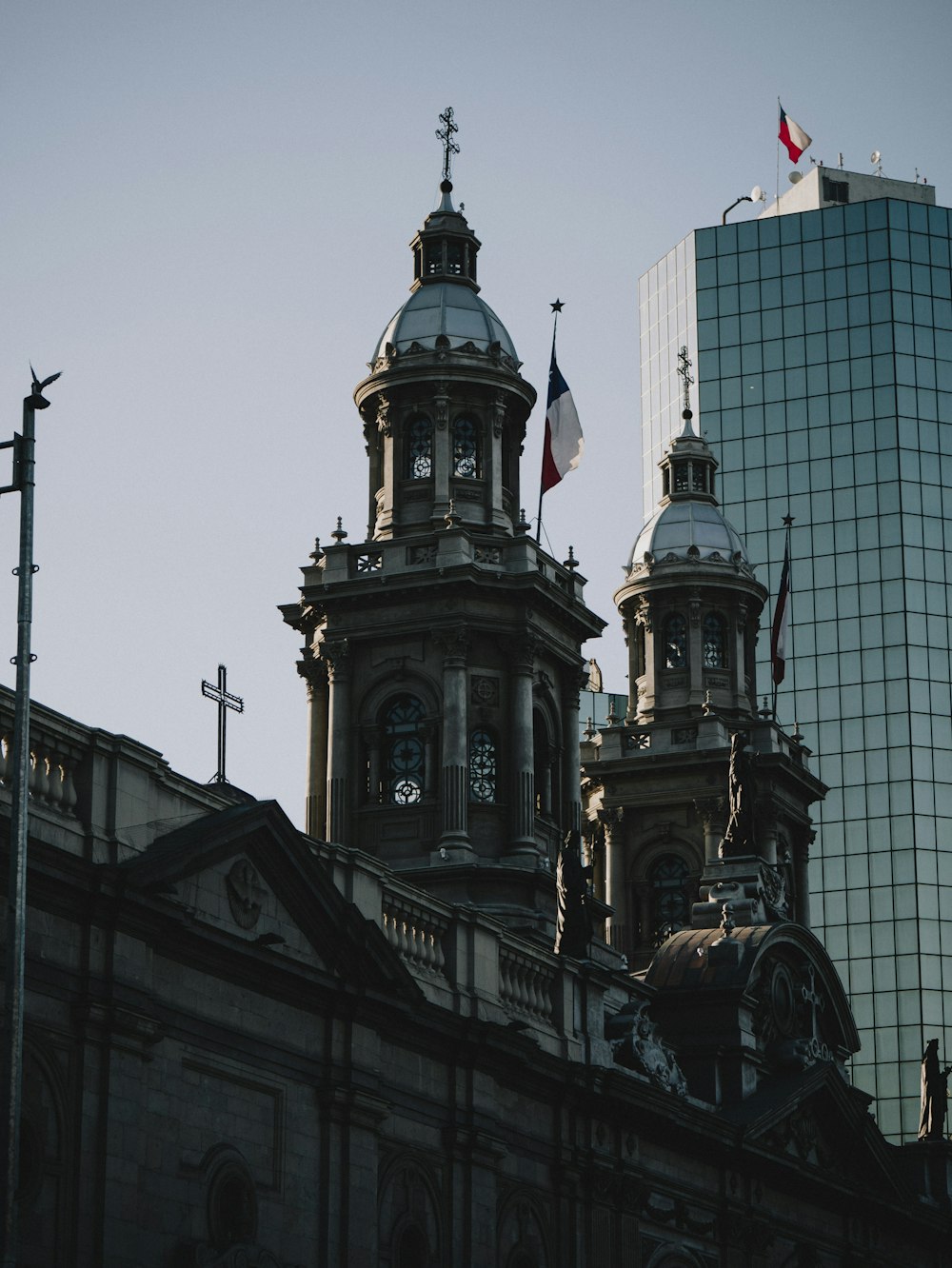 a large building with two towers and a clock