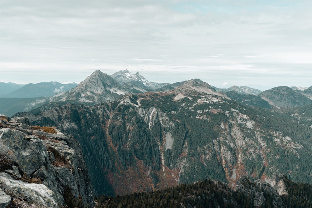 a person standing on top of a mountain