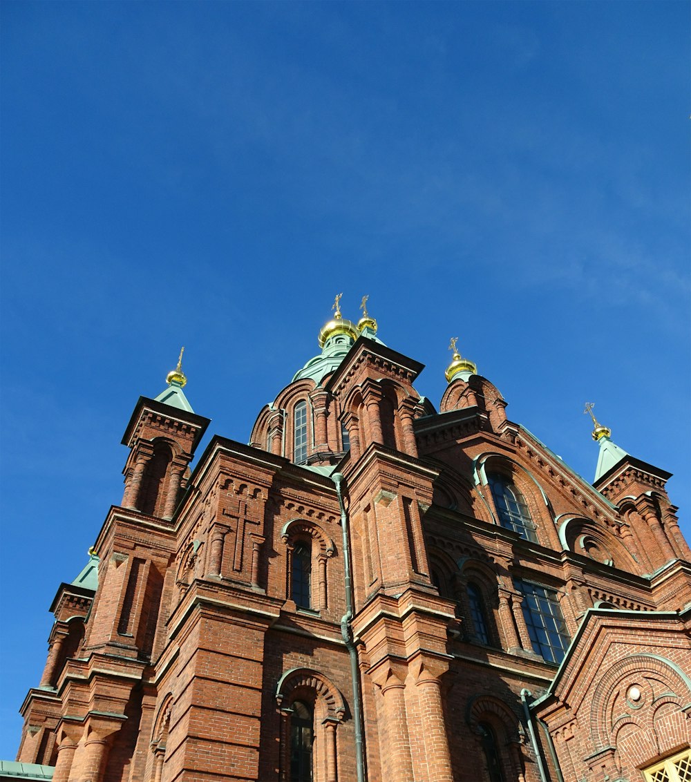 a very tall building with a clock on it's side