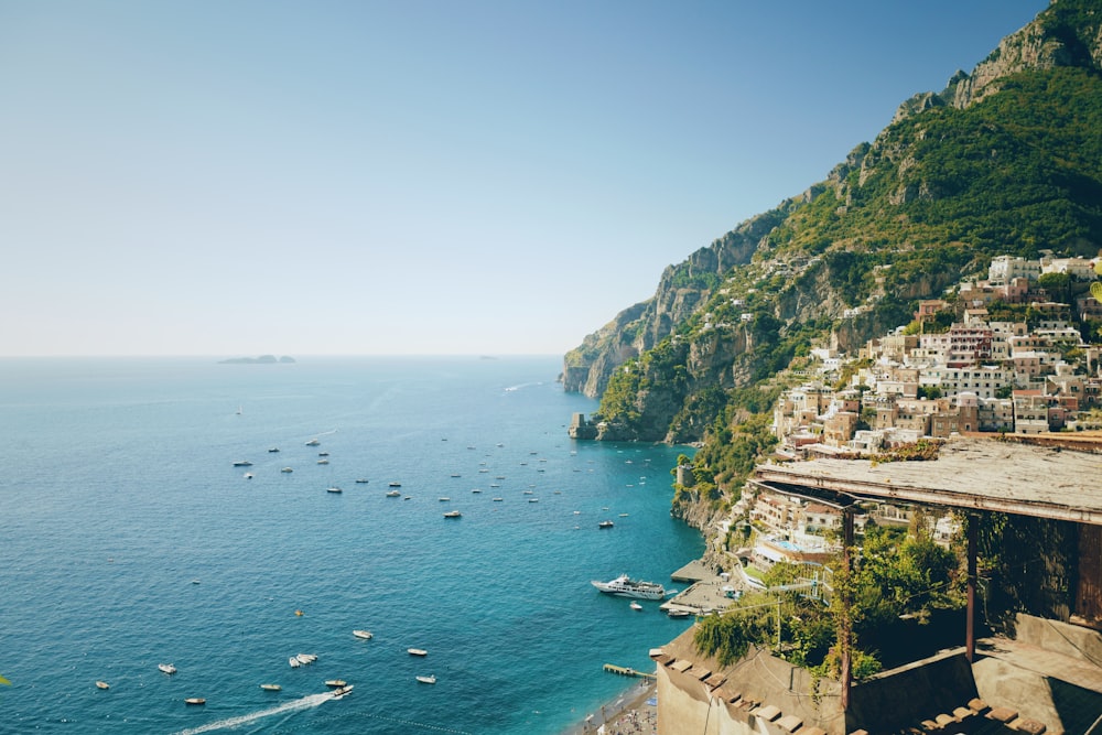 a view of a beach with boats in the water