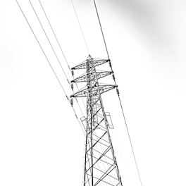 a black and white photo of power lines