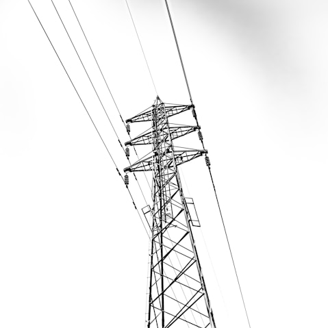 a black and white photo of power lines