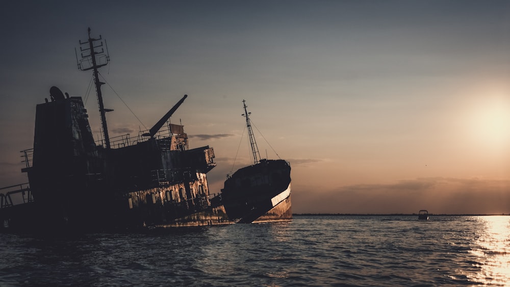 a large boat floating on top of a body of water