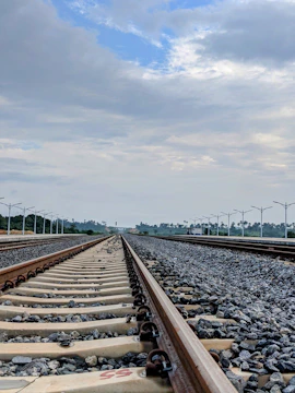 Railway tracks stretching between France and Morocco symbolizing connection.