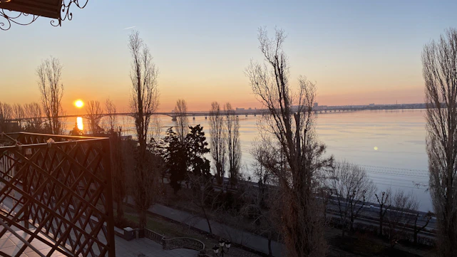 A calm sunrise over a bridge symbolizing new beginnings in learning.