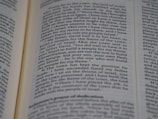 An open page of a book, likely a Bible, with text in English. The text includes a passage discussing historical religious figures and events.