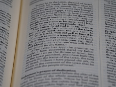 An open page of a book, likely a Bible, with text in English. The text includes a passage discussing historical religious figures and events.