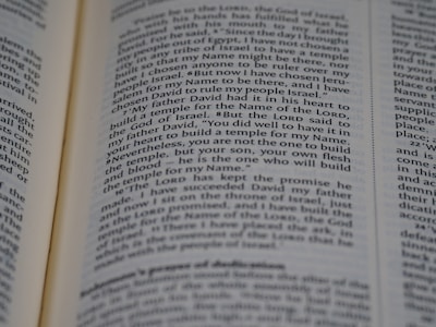 An open page of a book, likely a Bible, with text in English. The text includes a passage discussing historical religious figures and events.