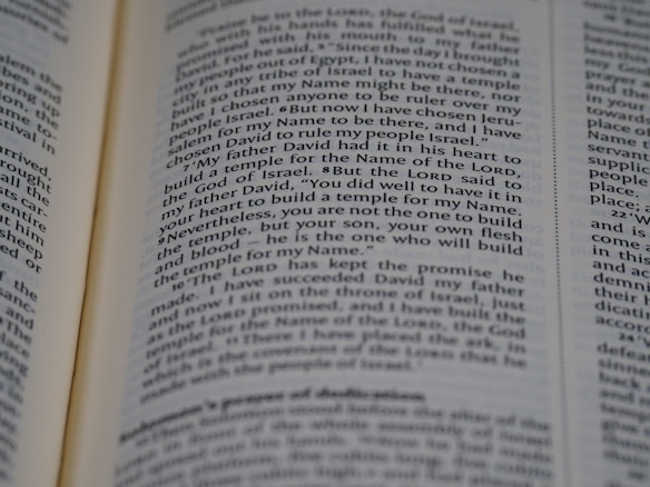 An open page of a book, likely a Bible, with text in English. The text includes a passage discussing historical religious figures and events.