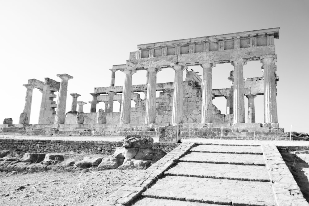 a black and white photo of the ruins of a building