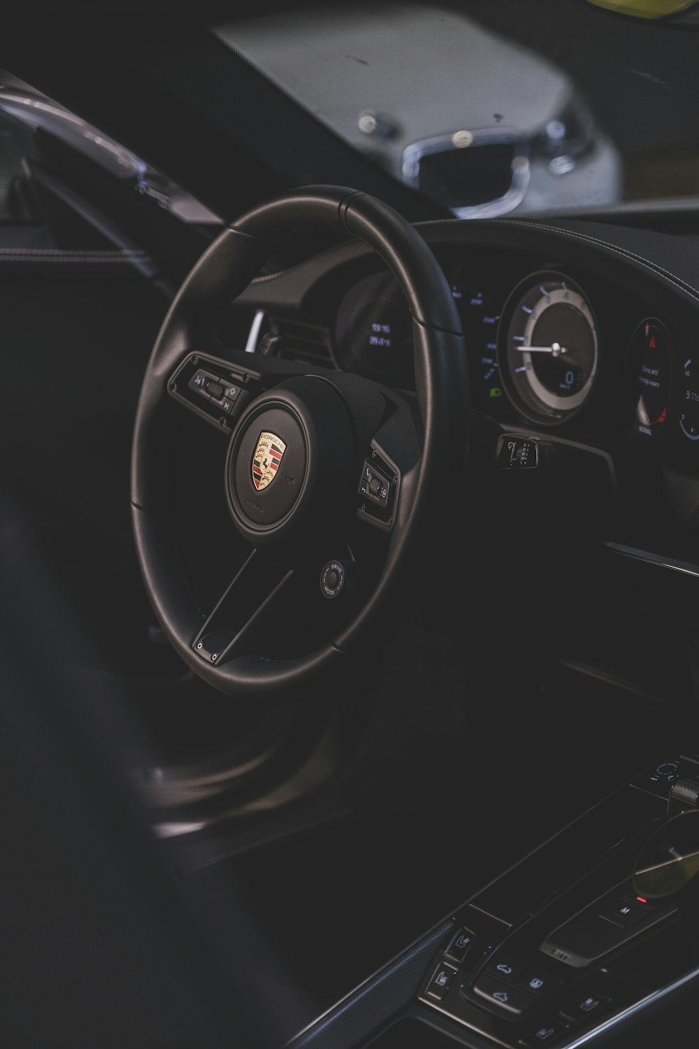 a steering wheel and dashboard of a car