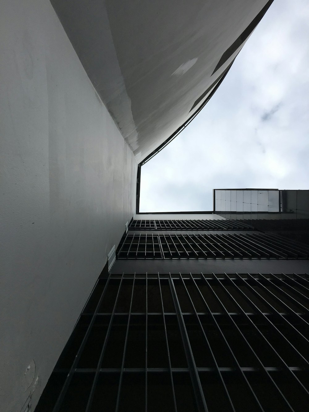 a very tall building with a sky in the background