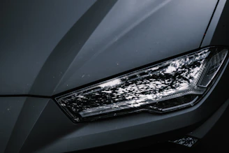 a close up of the headlight of a car