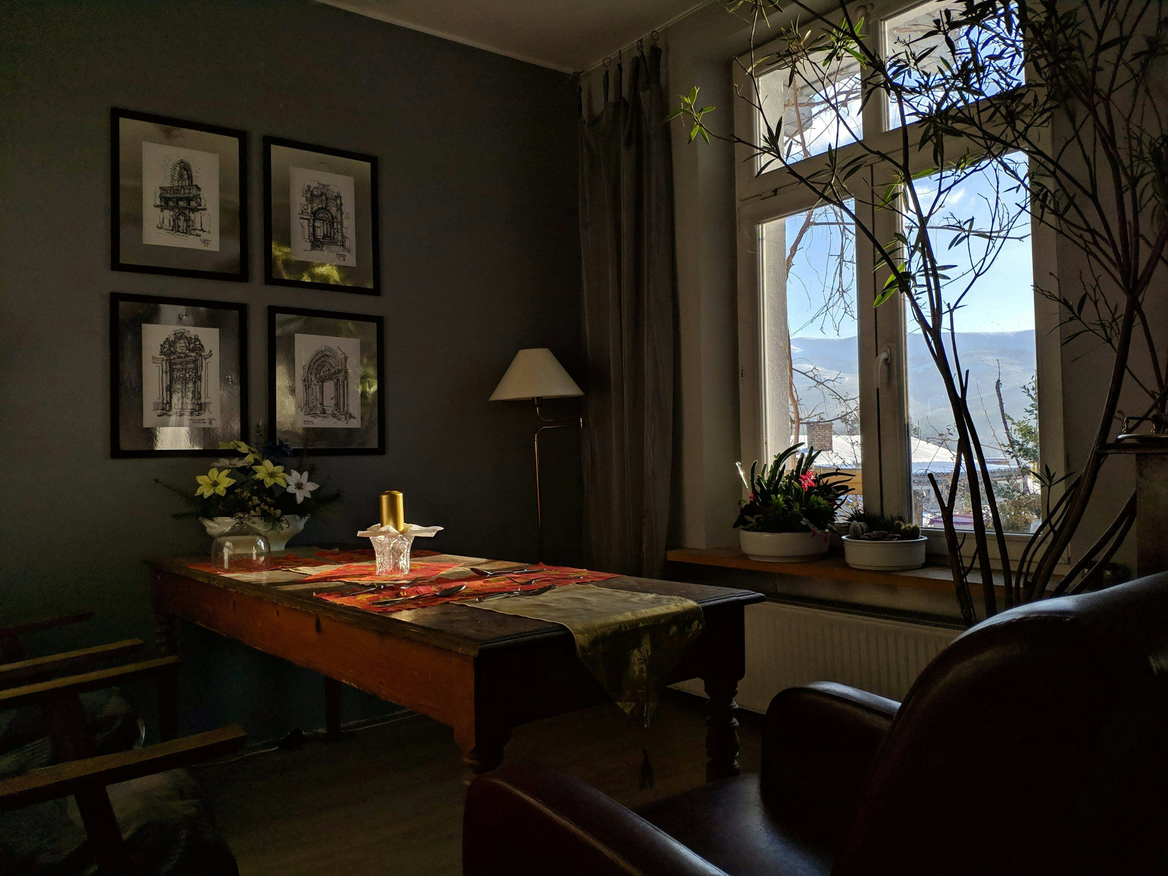 a living room with a couch and a table