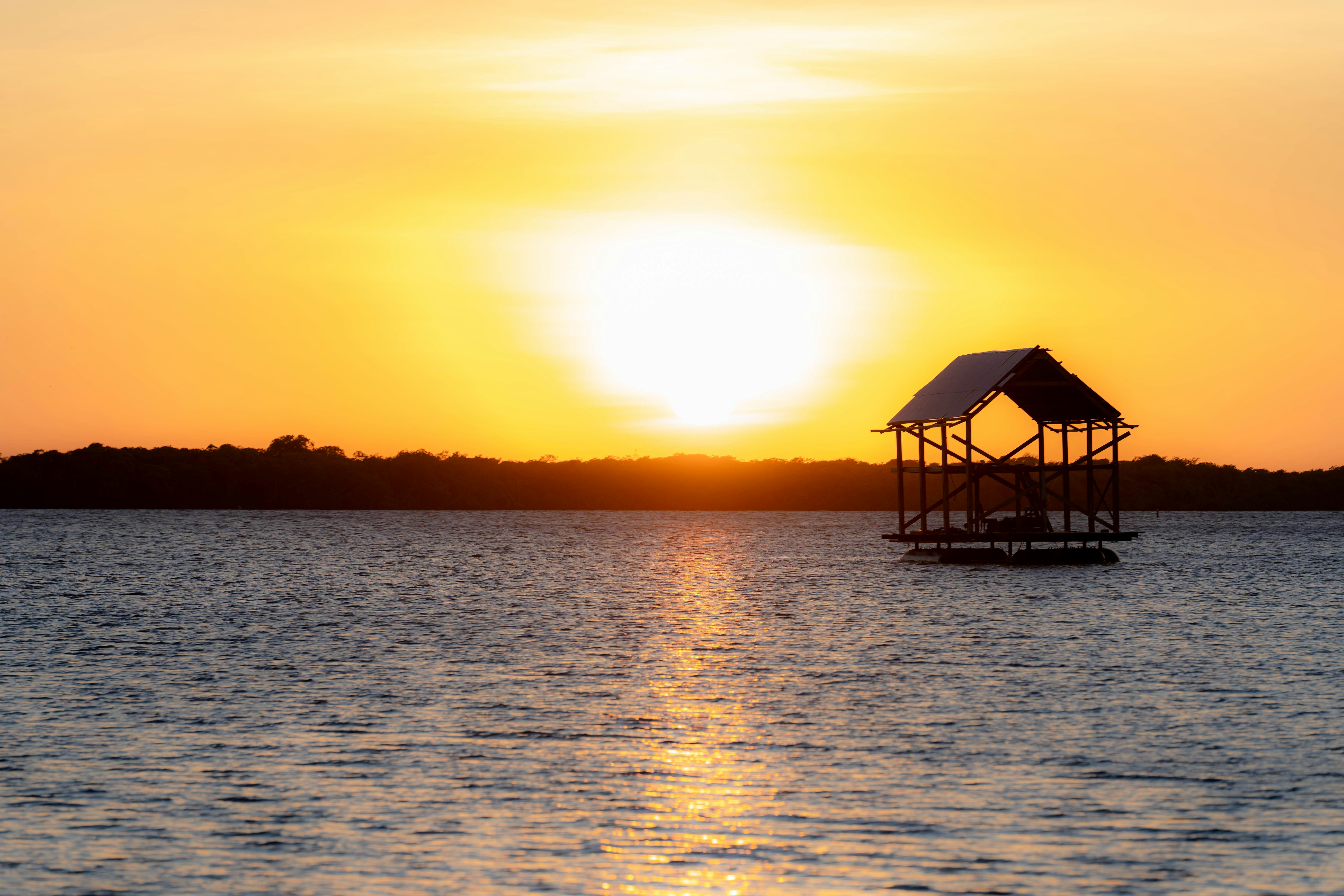 a boat floating on top of a body of water