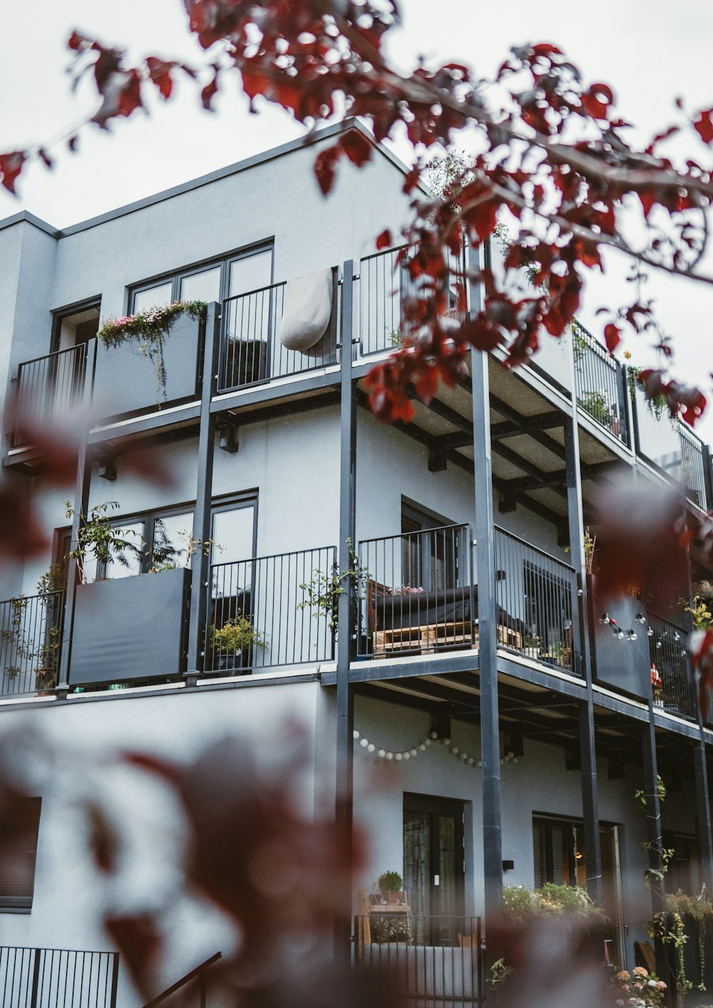 an apartment building with balconies and balconies on the balconies