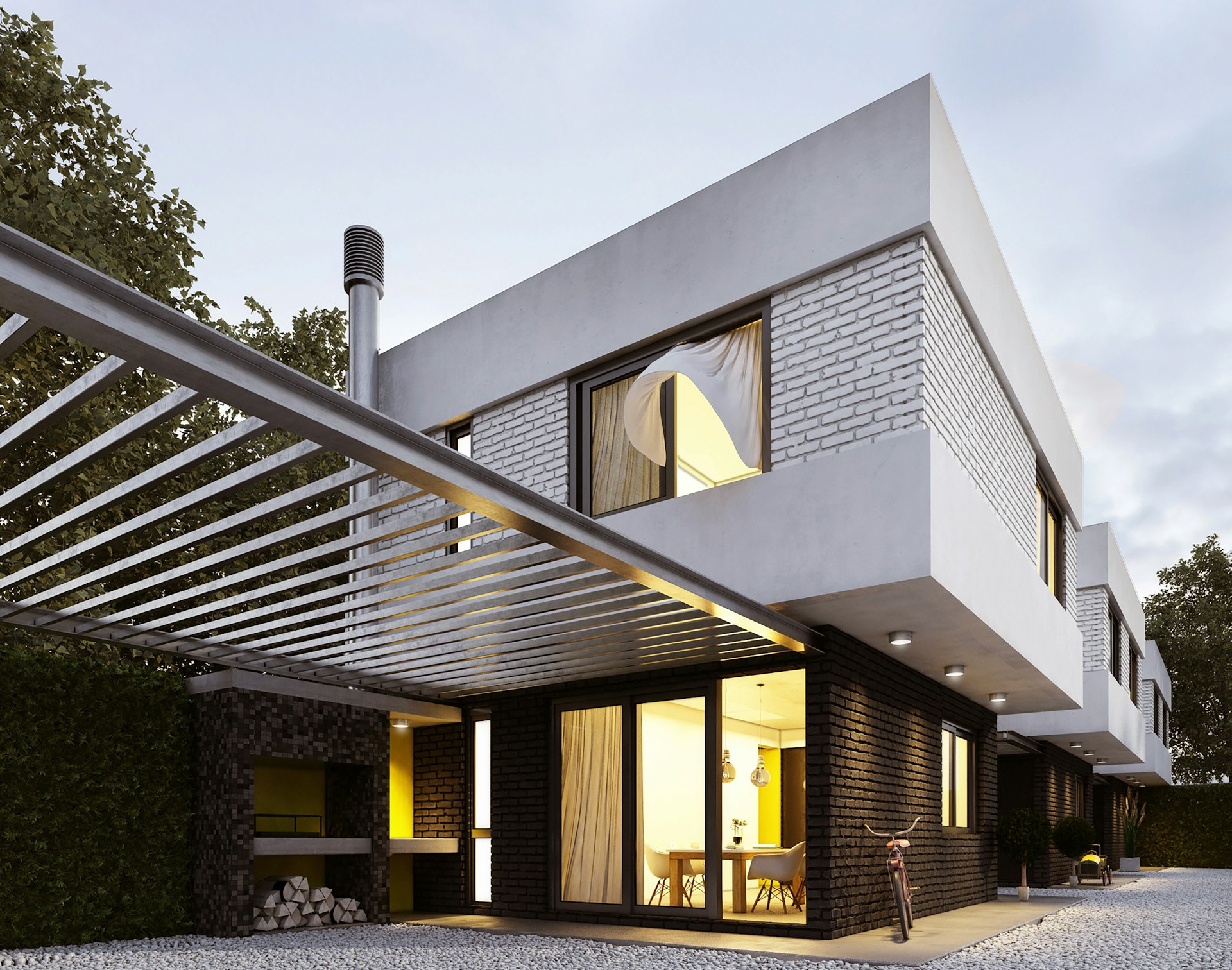 A modern two-storey home with a steel pergola and warm light spilling from floor-to-ceiling glass