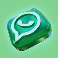 A glossy green three-dimensional icon of a speech bubble with a telephone handset