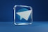 a blue square with a white paper airplane