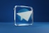 a blue square with a white paper airplane