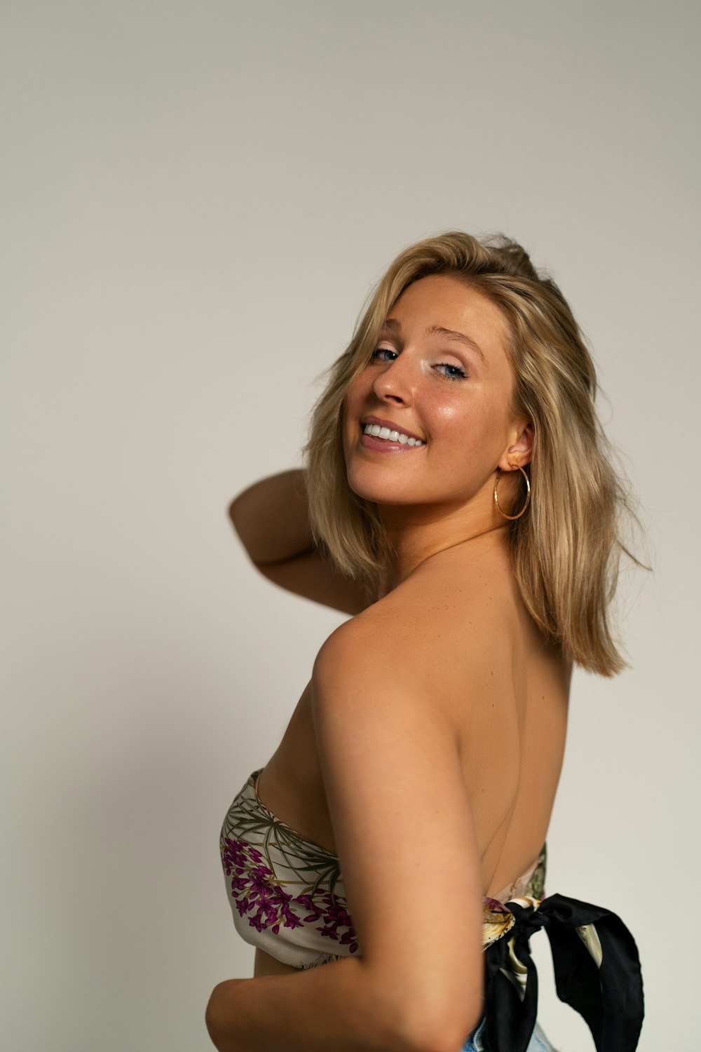 a woman in a bathing suit posing for a picture