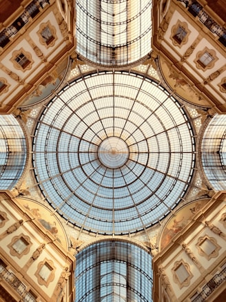 the ceiling of a building with a glass dome