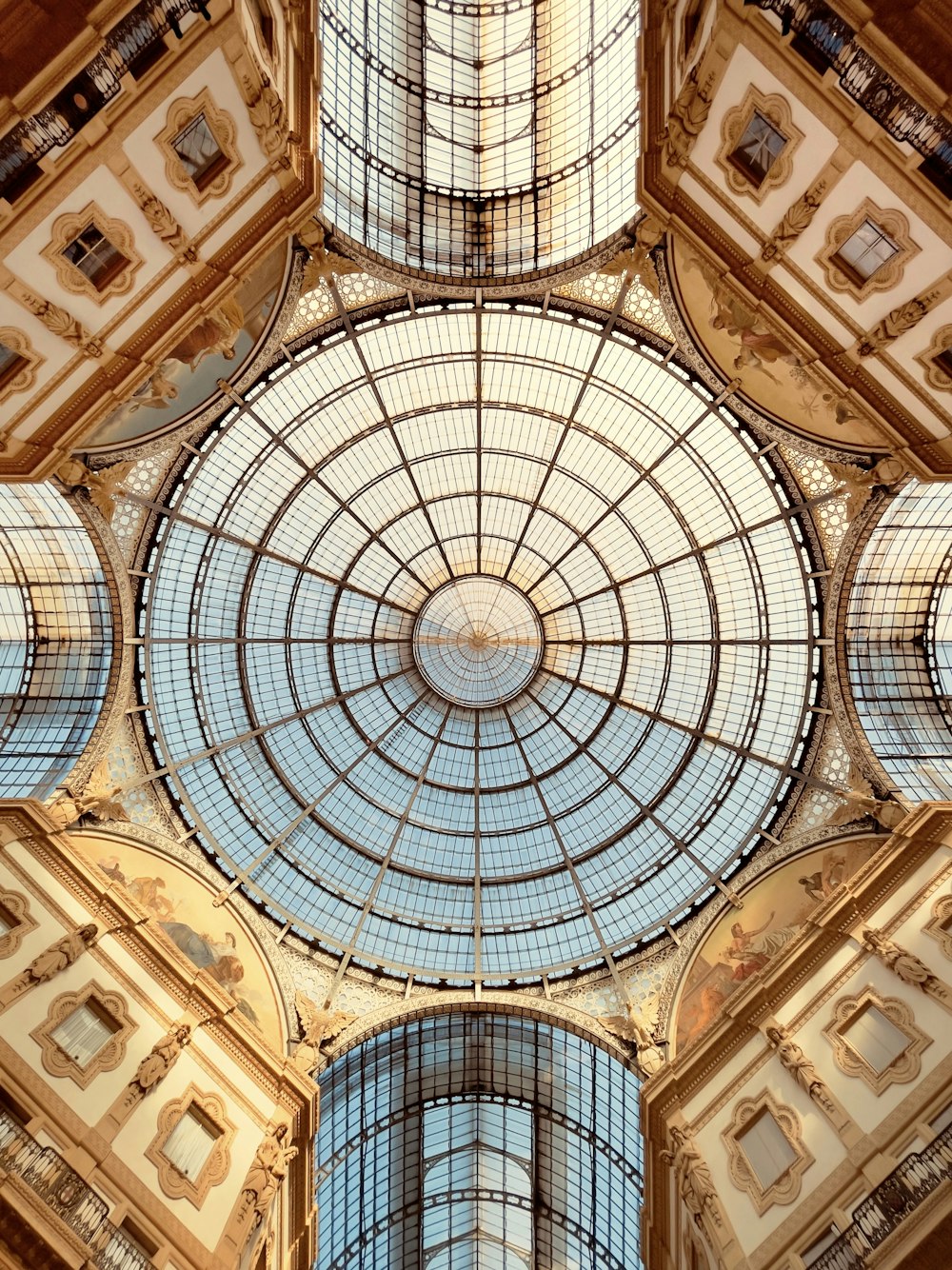 the ceiling of a building with a glass dome