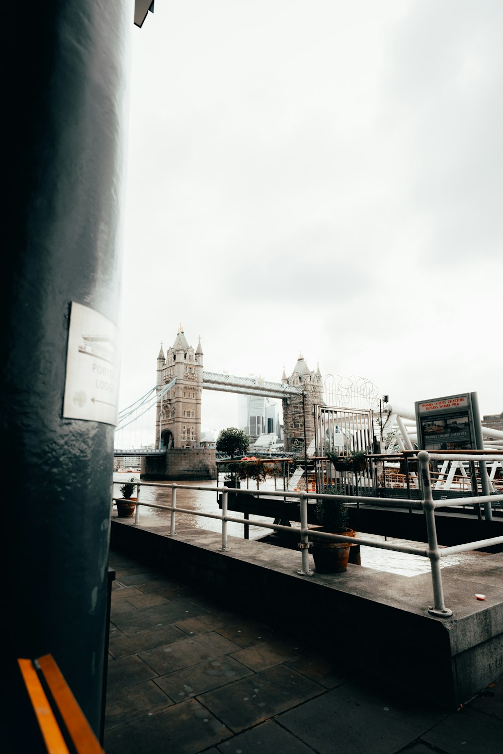 a view of the tower bridge from a walkway