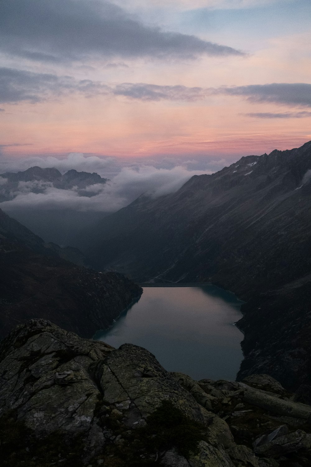 a view of a lake surrounded by mountains