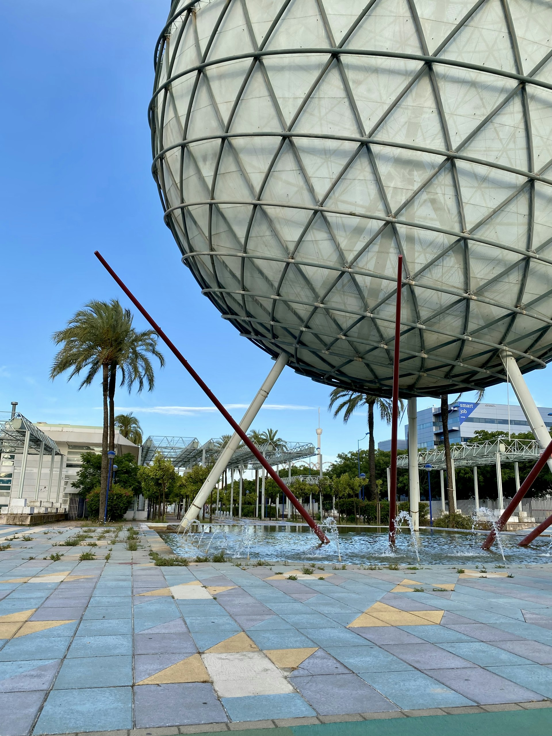 a large metal object sitting on top of a sidewalk