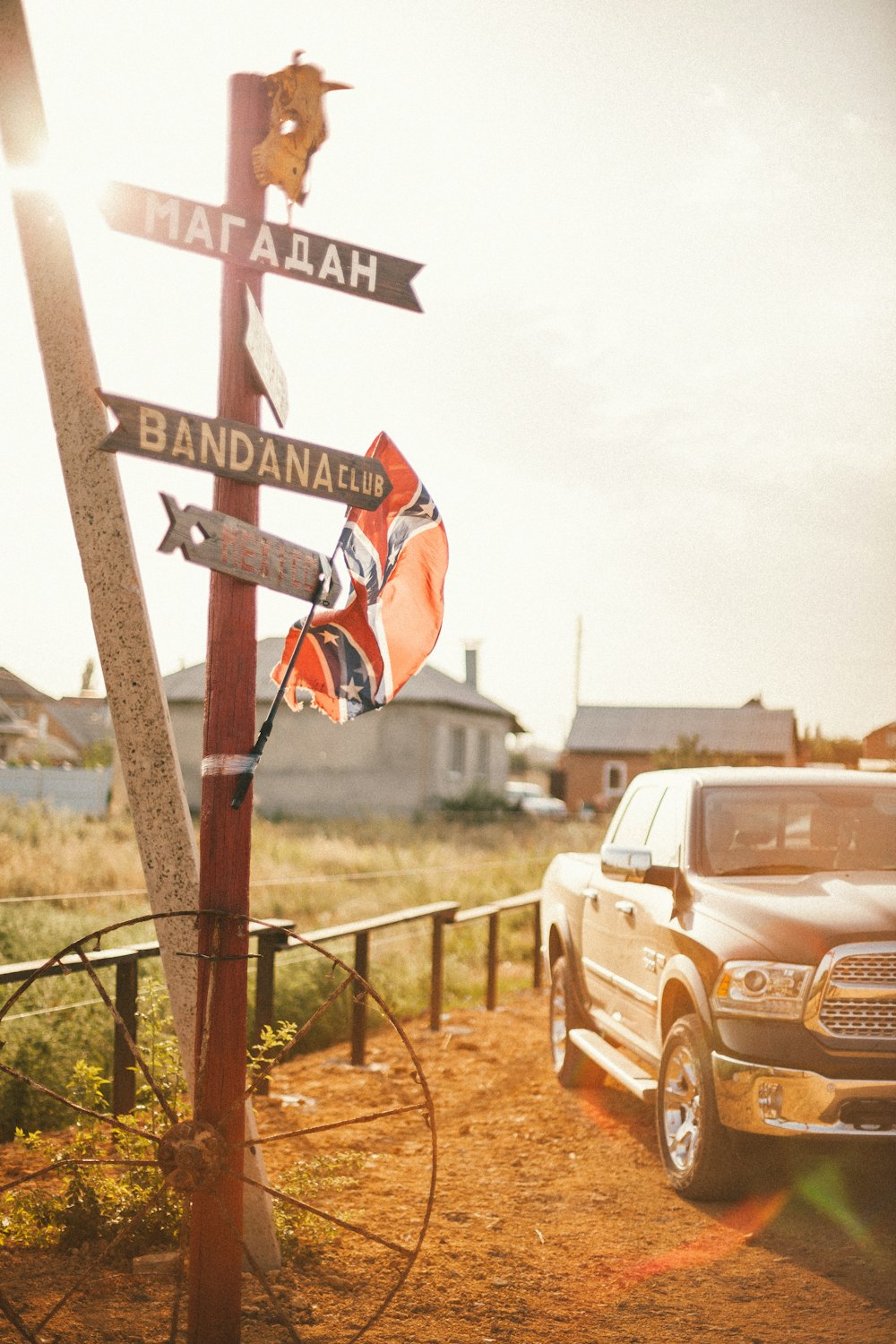 a truck parked next to a road sign